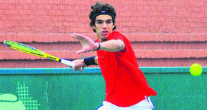 A player in action during a tennis match at the CLTA, Sector 10, in Chandigarh on Monday.
