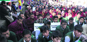Tibetans hold a rally in Dehradun against Chinese atrocities on Monday.