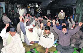 Roadways employees protest in support of their demands in Karnal on Monday