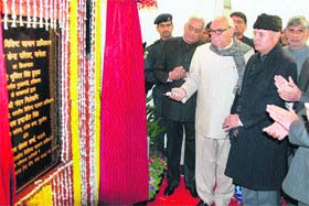 Chief Minister Bhupinder Singh Hooda unveils a plaque marking the stone-laying of a UIDAI data centre at Manesar, near Gurgaon, on Monday