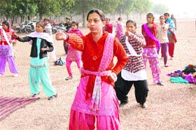 Girls learn martial arts in Police Lines at Sirsa on Monday