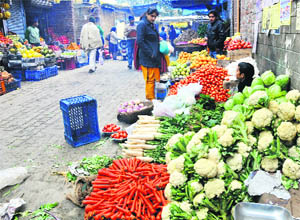 A deserted vegetable and fruit mandi in the Parade area, Jammu, on Monday.