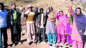 Residents travel long distance to procure water for daily use in the Dharal area. 