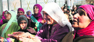 Devotees offer prayers at the shrine of Sultan-ul-Arifeen Hazrat Sheikh Hamza Makhdoom on his birth anniversary in Srinagar. 