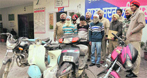 Vehicle lifters along with impounded motorcycles in police custody in Ludhiana on Monday. 
