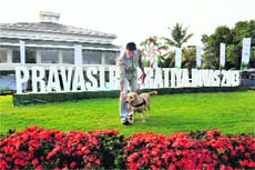 A security man inspects the venue of the Pravasi Bharatiya Divas celebrations in Kochi on Monday. 