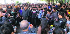 Demonstrators gather near the headquarters of Southern Weekly newspaper in Guangzhou on Monday.
