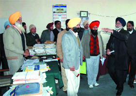 Punjab Education Minister Sikander Singh Maluka gestures while speaking to the staff during a surprise checking of the office of the DEO at the District Administrative Complex in Bathinda on Tuesday.
