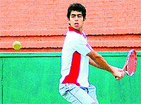 Pranav Suri in action during a tennis match at the CLTA, Sector 10, in Chandigarh on Tuesday
