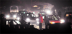 Policemen try to clear a traffic jam near Canara Bank, Sector 34, in Chandigarh on Tuesday