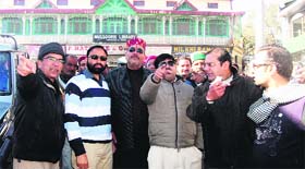 Urban Development Minister Preetam Panwar, along with other officials, conduct an inspection at Gandhi Chowk in Mussoorie on Tuesday.