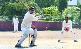 A batsman in action during a match in the 61st Dehradun District Cricket League in Dehradun on Tuesday.