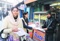 Leaders of the UKD (P) appeal to a shopkeeper to support of their bandh call on January 10, in Mussoorie on Tuesday.
