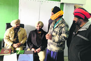 The murder accused, Charan Singh Chann, in police custody in Kartarpur on Tuesday. 