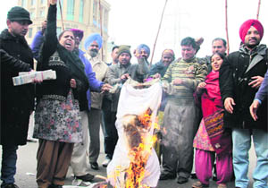 Activists of the Istri Mulajam Talmel Committee, Punjab, protest against the rising crime against women in Jalandhar on Tuesday. 