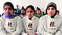 Girls take part in a vocational training programme at Reasi on Tuesday