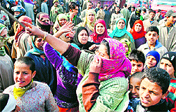 Protesters at a Srinagar highway on Tuesday