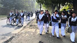 Students of the secondary section on way to school as the education department did not extend the vacations due to cold wave in Ludhiana on Tuesday.