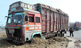 A loaded truck that rammed into a roundabout at Gill village on the Ludhiana-Malerkotla road on Tuesday.