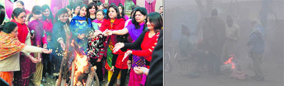 With the cold wave gripping the region, women celebrate Lohri a few days ahead of the festival. A group of people battles cold by lighting a bonfire on a foggy morning in Amritsar on Wednesday.