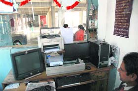 An official sits idle as computers remain non-functional at the ISBT-43 in Chandigarh on Wednesday
