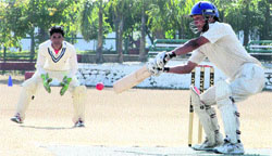 A batsman tries to cut a ball in a match in the 61st Dehradun District Cricket League played at Col Browns School in Dehradun on Wednesday. Tribune photo: Vinod Pundir