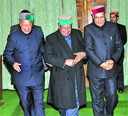 CM Virbhadra Singh and Leader of Opposition PK Dhumal accompany Speaker Brij Bihari Butail at the Vidhan Sabha in Dharamsala on Wednesday