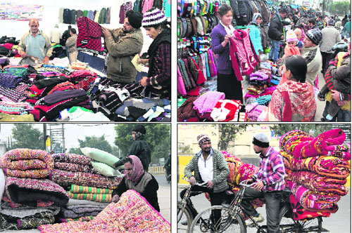 Residents purchase woollens at a sale in Virsa Vihar, near Namdev Chowk; some buy from roadside vendors near Jyoti Chowk; vendors sell quilts in a locality; and a migrant labourer stitches a quilt at a roadside in Jalandhar on Wednesday.