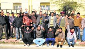 Members of the Government Employees Association protest for the second day in Jammu on Wednesday