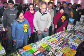 School Education Commissioner Secretary Farroq Ahmed visits the book fair in Jammu on Wednesday