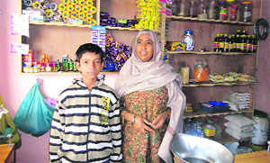 Rani, once a narcotic smuggler, runs a grocerry shop at Jhorar village in Muktsar on Wednesday.