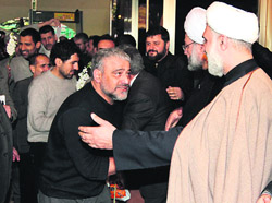 Shiite clerics and other officials greet men freed by Syrian rebels in Damascus on Wednesday.