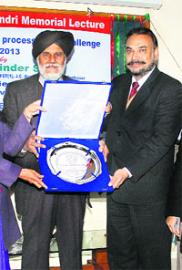 Dr Narpinder Singh being honoured at Guru Nanak Dev University in Amritsar on Thursday.