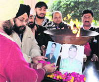 Activists of the International Human Rights Organisation pay tributes to the killed soldiers at Jallianwala Bagh in Amritsar on Thursday.