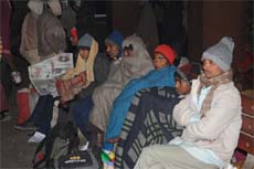 Passengers crowd the platform at the Bathinda junction while waiting for the trains delayed by the inclement weather. 