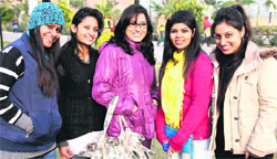 Students of LPU enjoy the sunshine on the university campus in Phagwara, near Jalandhar, on Thursday. Tribune Photo: Malkiat Singh 