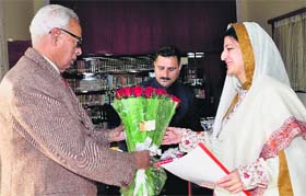 Governor NN Vohra with member of state Legislative Council at Raj Bhawan in Jammu on Thursday