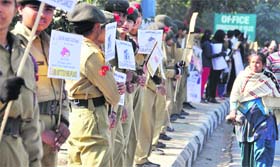 NCC cadets form a human chain to spread traffic awareness among residents in Ludhiana on Thursday