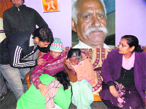 Members of the victims family grieve in Pinjore on Friday; and (inset) Krishan Lal.