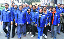 Tarun Vijay, BJP Rajya Sabha MP, leads activists during a walkathon for creating awareness about traffic rules in Dehradun on Friday. Tribune photo: Vinod Pundir 