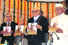 (From right) Haryana Governor Jagannath Pahadia, Chief Minister Bhupinder Singh Hooda, Saroj Siwatch and Prof Raghuvindra Tanwar at the release of a book in Chandigarh on Friday. 
