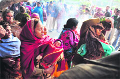 Women celebrate Lohri for the girl child in Ludhiana on Friday. Tribune photo: Himanshu Mahajan 