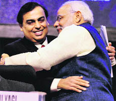 Gujarat CM Narendra Modi hugs industrialist Mukesh Ambani at the Vibrant Gujarat Global Investors Summit in Gandhinagar on Friday. 