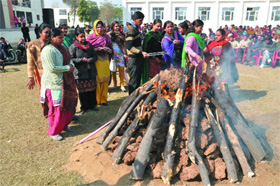 Students celebrating Lohri at Guru Kashi University in Talwandi Sabo on Saturday.