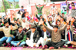 Members of the Bhartiya Gujjar Mahasabha raise demands, including those for hostel facility and distribution of scholarships, in Jammu on Saturday