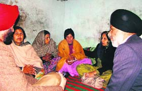 Samana MLA Surjit Singh Rakhra (right) visited the family and handed over a job letter for a member of the family