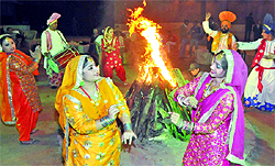 People celebrate Lohri in Delhi on Sunday