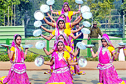 Schoolchildren rehearse for the Republic Day Parade at Rajpath near India Gate in New Delhi on Sunday