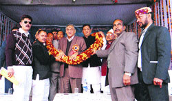 Uttarakhand Chief Minister Vijay Bahuguna garlanded after the inauguration of the historic cultural festival of Uttarayani at Bageshwar on Sunday.