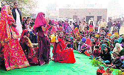 Women celebrate birth of girls at Khairekan village in Sirsa